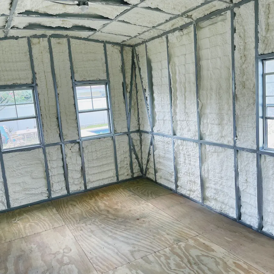 Closed-cell spray foam insulation applied to wall cavities in a residential project in Niagara Falls